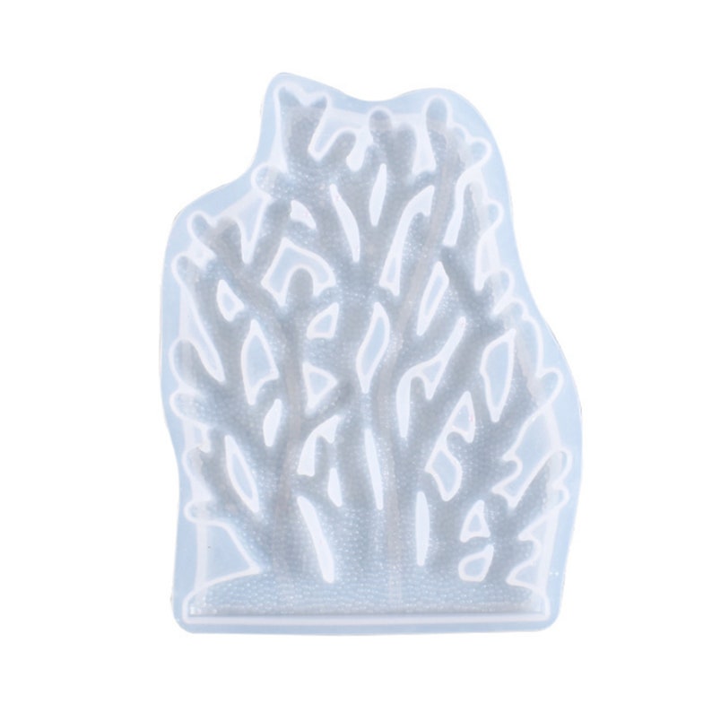 Puede incluir: Un molde de silicona azul claro con forma de arrecife de coral. El molde tiene un dise&ntilde;o detallado con muchas ramas y una base texturizada. El molde est&aacute; dise&ntilde;ado para manualidades y la creaci&oacute;n de art&iacute;culos decorativos.