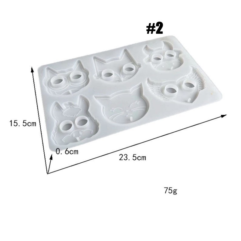 Pu&ograve; includere: Stampo in silicone bianco con sei diverse forme di viso di animali. Lo stampo &egrave; lungo 23,5 cm e largo 15,5 cm. Lo stampo pesa 75 grammi. Lo stampo &egrave; etichettato #2.