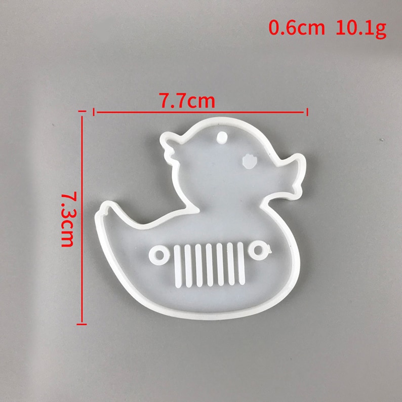 Cute duck keychain and pendant silicone resin mold for DIY gifts and jewelry making. Flexible and durable material for easy release. Use with epoxy resin, UV resin, concrete, plaster, and more. Shop now at https://findingeye.etsy.com