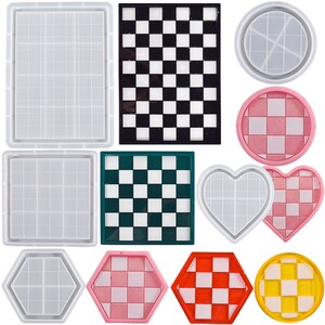 May include: Set of 10 silicone molds for resin crafts. The molds are in various shapes, including squares, hearts, and circles. Some molds have a checkered pattern.
