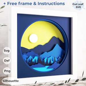 May include: A 3D papercraft model of a mountain landscape with a yellow sun and blue sky. The model is framed in a white frame and is ready to be assembled. The image includes the text "Svg, Dxf, Png, Silhouette".