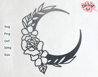 May include: Black and white line art design of a crescent moon with floral accents. The moon is surrounded by leaves and flowers, including roses and smaller blossoms.