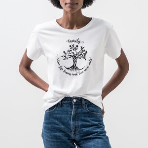 May include: White t-shirt with a black tree design and the text "Family where life begins and love never ends".