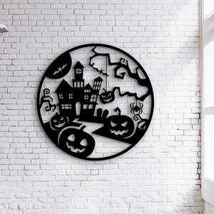 May include: Black metal Halloween wall art featuring a haunted house, jack-o'-lanterns, a spider, and a bat, all within a circular frame. The artwork is mounted on a white brick wall, creating a spooky seasonal decoration.