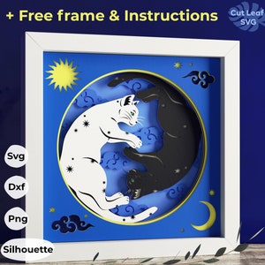 May include: A white frame with a blue background and a paper cut design of two cats in a yin yang symbol. The cats are white and black and are facing each other. The background is decorated with stars and clouds. The text "Free frame & Instructions" is at the top of the image.