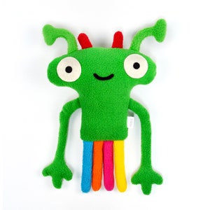 Cute plush rainbow alien