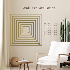 The image is a wall art size guide, showing the dimensions of various wall art pieces in a room with a white chair, a potted plant, and a wooden table.
