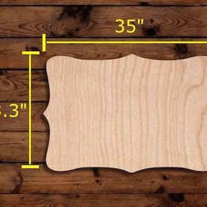 May include: A light-colored, unfinished wooden sign with a decorative, scalloped edge. The sign measures 35 inches wide and 23.3 inches tall. The background is a dark brown wooden surface.