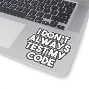 May include: A white sticker with black text on a silver laptop. The text reads "I DON'T ALWAYS TEST MY CODE".