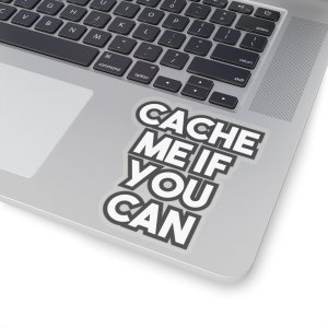 May include: A white sticker with black text on a silver laptop. The text reads "CACHE ME IF YOU CAN".