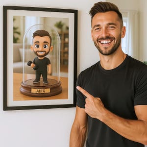 May include: A framed illustration of a cartoon person holding a dumbbell. The cartoon person is inside a glass dome on a wooden base. The base has the name "ALEX" written on it.
