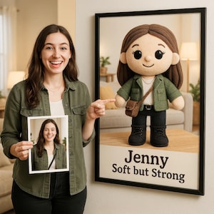 May include: A framed photo of a plush toy doll with brown hair, wearing a green jacket and black pants. The doll is holding a brown bag. The photo has the text "Jenny Soft but Strong" below the doll.