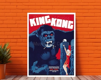 May include: A vintage movie poster for the 1933 film "King Kong". The poster features a large, menacing gorilla with red eyes and a woman in a red dress climbing a stone pillar. The text "King Kong" is in large, bold letters at the top of the poster.