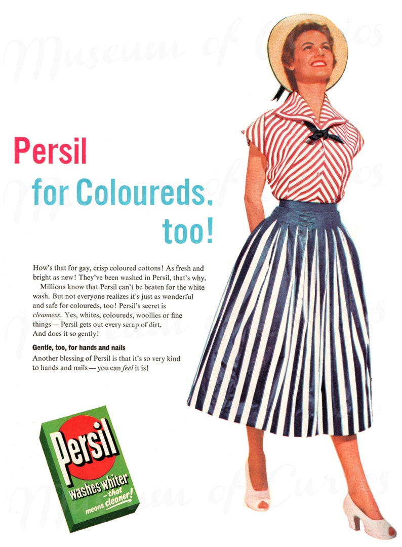 May include: Vintage advertisement for Persil laundry detergent. The image features a woman in a striped top and skirt, a straw hat, and white heels. The Persil box is green with red text. Text reads "Persil for Coloureds, too!"