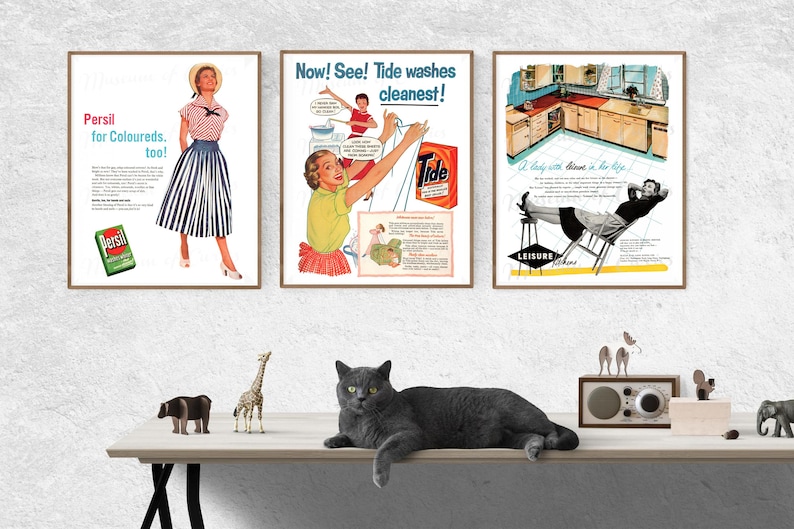 May include: Three framed vintage advertisements. The first features a woman in a skirt, the text "Persil for Coloureds, too!" and a box of Persil. The second shows a woman with the text "Now! See! Tide washes cleanest!" and a Tide box. The third shows a woman relaxing with the text "A lady with leisure in her life."