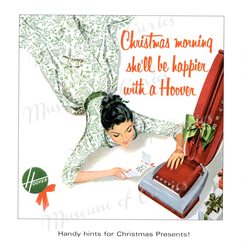 May include: A vintage advertisement for a Hoover vacuum cleaner. The ad features a woman in a white dress with green floral print, looking down at a red and silver Hoover vacuum cleaner. The text reads "Christmas morning she'll be happier with a Hoover".