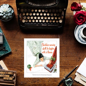 May include: A vintage advertisement for a Hoover vacuum cleaner. The ad features a woman in a white dress and a red bow, smiling as she uses the vacuum cleaner. The text reads "Christmas morning she'll be happier with a Hoover."  Handy hints for Christmas presents!
