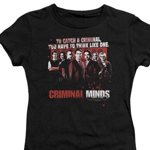 May include: Black t-shirt with a red and white graphic of the Criminal Minds cast and the text "To catch a criminal, you have to think like one. Criminal Minds."