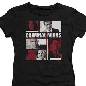 May include: Black t-shirt with a collage of images of the cast of the TV show "Criminal Minds". The text "Criminal Minds" is printed in white letters on a red background.