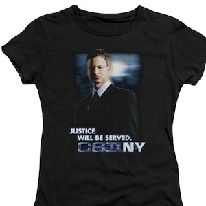 May include: Black t-shirt with a graphic of a man in a suit and the text "Justice will be served. CSI:NY"