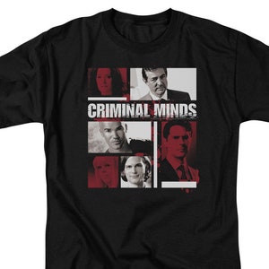 May include: Black t-shirt with a red and white graphic of the cast of the TV show "Criminal Minds".