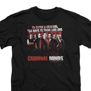 May include: Black t-shirt with a red graphic of the Criminal Minds cast and the text "To catch a criminal, you have to think like one." and "Criminal Minds".