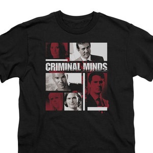 May include: Black t-shirt with a red and white graphic of the cast of the TV show "Criminal Minds".