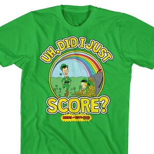 May include: Green t-shirt with a cartoon image of Beavis and Butt-Head dressed as leprechauns. The text on the shirt reads "Uh, Did I Just Score?" with a rainbow above the characters.