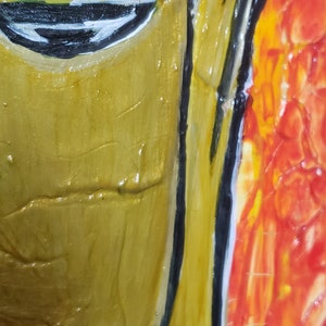 May include: Close-up of a painting with a textured, yellow background and a black line separating it from a red, orange, and yellow background.