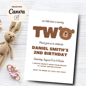 May include: A white invitation card with brown text and a cartoon bear. The text reads "our little bear is turning TWO. Please join us to celebrate DANIEL SMITH'S 2ND BIRTHDAY. Saturday, August 23 at 3:00 pm. 1 SOUTH COUNTY ROAD PALM BEACH, FL 33480 UNITED STATES. RSVP TO EMMA AT (555) 867-5309"