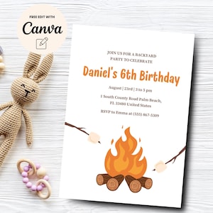 May include: A printable invitation for a 6th birthday party with a campfire theme. The invitation is orange, white, and brown with a cartoon campfire and marshmallows. The text reads "Join us for a backyard party to celebrate Daniel's 6th Birthday. August | 23rd | 3 to 5 pm. 1 South County Road Palm Beach, FL 33480 United States. RSVP to Emma at (555) 867-5309."