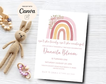 May include: A pink, orange, and yellow watercolor rainbow with floral accents. The text "isn't she lovely, isn't she onederful" is above the rainbow. The text "Dancila Bloom is turning one" is below the rainbow. The invitation includes the date, time, and location of the birthday party.