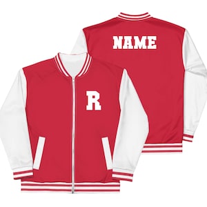 May include: Red and white varsity jacket with the letter "R" on the front and "NAME" on the back. The jacket has a zip closure, white sleeves, and white and red striped trim on the collar, cuffs, and hem.