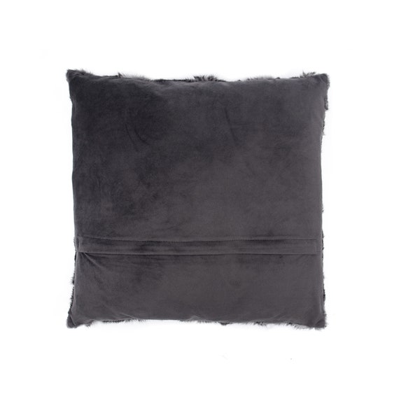 black fuzzy throw pillow