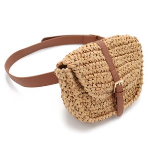 Beige straw fanny pack with a brown pleather belt