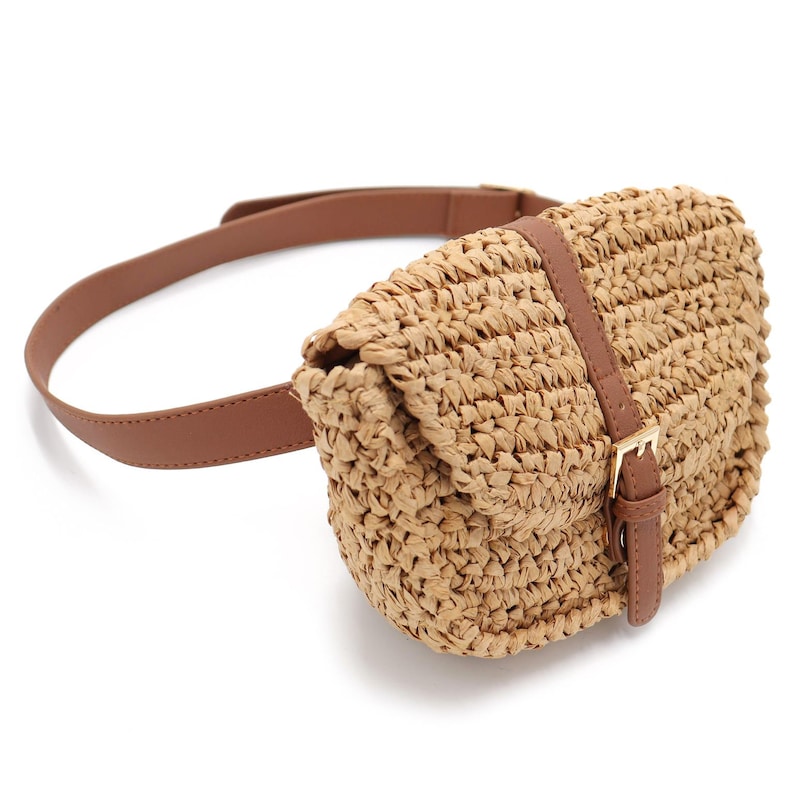 Beige straw fanny pack with a brown pleather belt