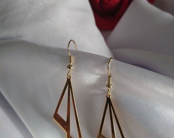 Beautiful golden asymmetric earrings