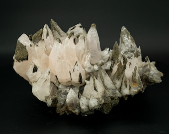 UV-reactief groot roze dogtooth-calcietkristal Fujian