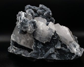 UV-reactief helder calciet op zwart druzy-kristalkwarts Fujian