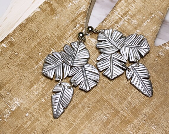 Paradise Palm Statement Earrings Metallic Silver leaf statement
