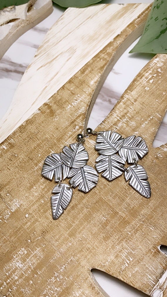 Paradise Palm Statement Earrings Metallic Silver leaf statement