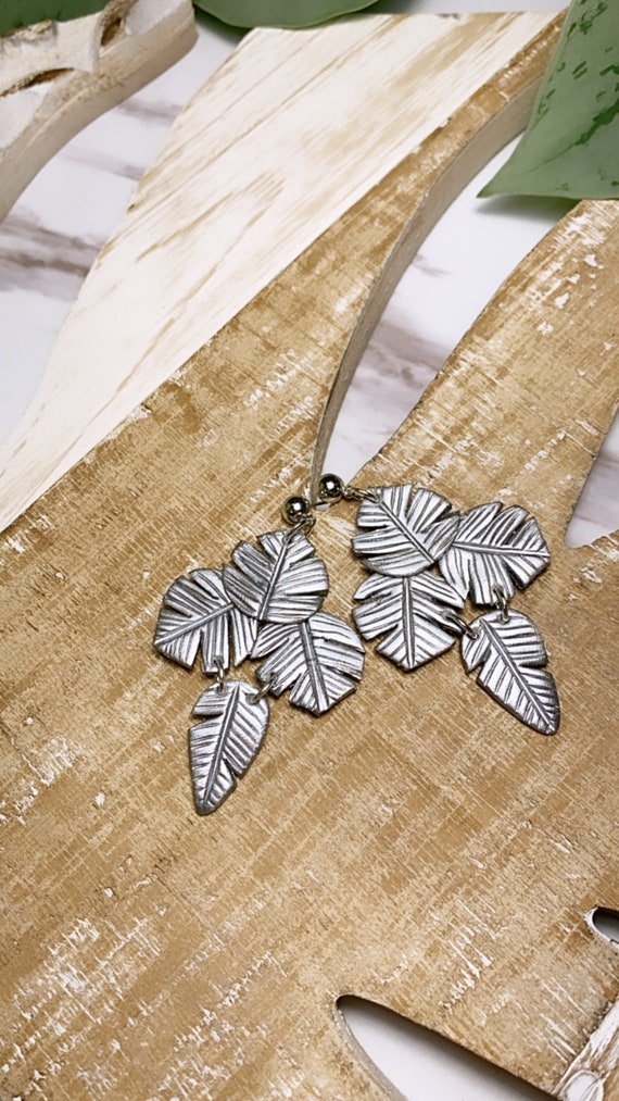 Paradise  Palm Statement Earrings Metallic Silver   leaf statement