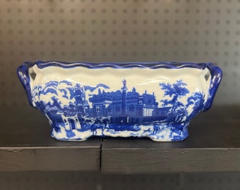 Jardinera festoneada para baño de pies en azul y blanco