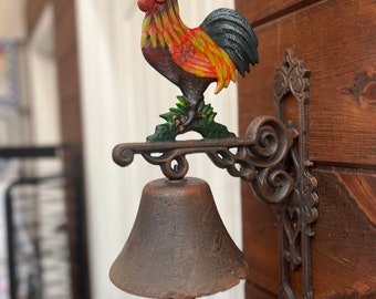 Campana de gallo de hierro fundido