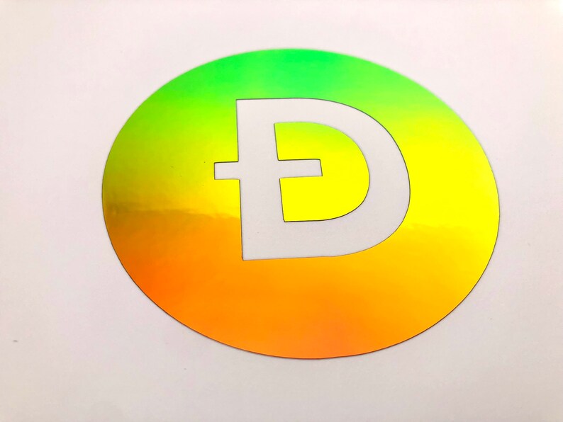 Puede incluir: Una pegatina redonda con un degradado de verde, amarillo y naranja. La pegatina tiene una letra "D" blanca con una barra transversal en el centro.