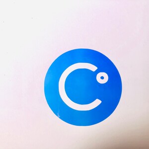 May include: A blue circle with a white letter "C" and a white dot inside the circle.