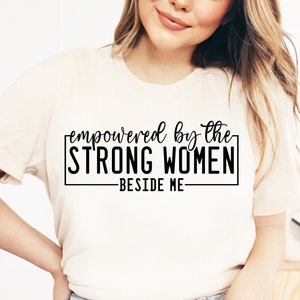 Strong Women SVG, Empowered by the Women Beside Me PNG, Empower Woman Shirt Svg, Women Empowerment Quote Svg, She Is Strong Svg