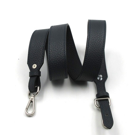 white leather bag strap