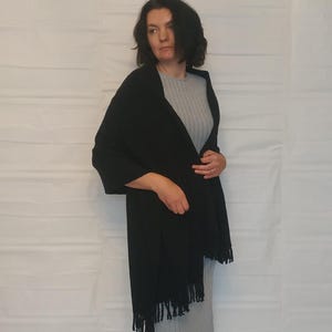Black wool shawl Dark wrap scarf Boho black blanket Witchcore wrap shawl Gothic wool wrap Hand knit cloak Fringed black shawl for magic
