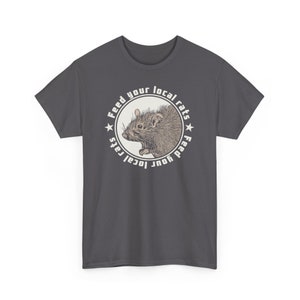 May include: A dark gray t-shirt with a white circle graphic featuring a rat and the text "Feed your local rats Feed your local cats".